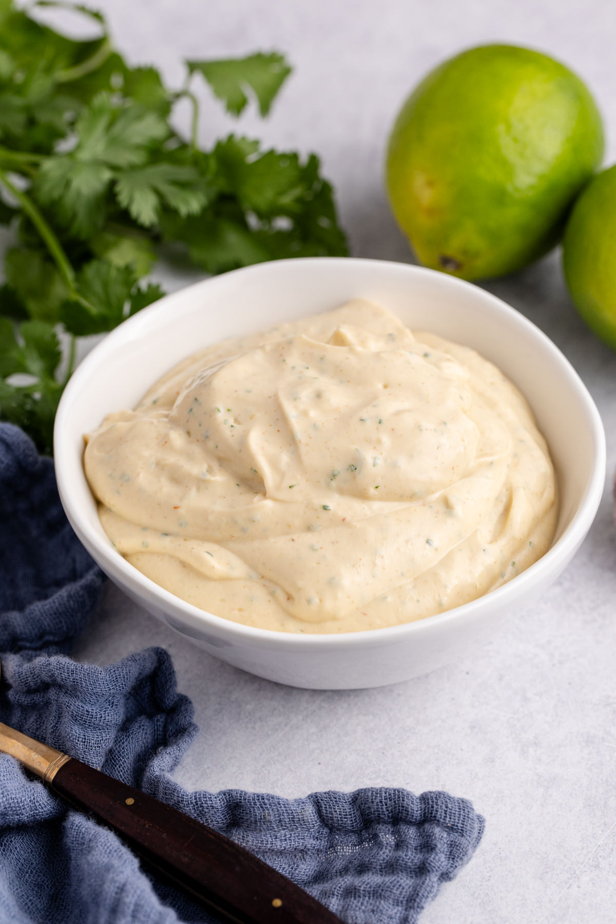 Fish taco sauce in a white bowl.