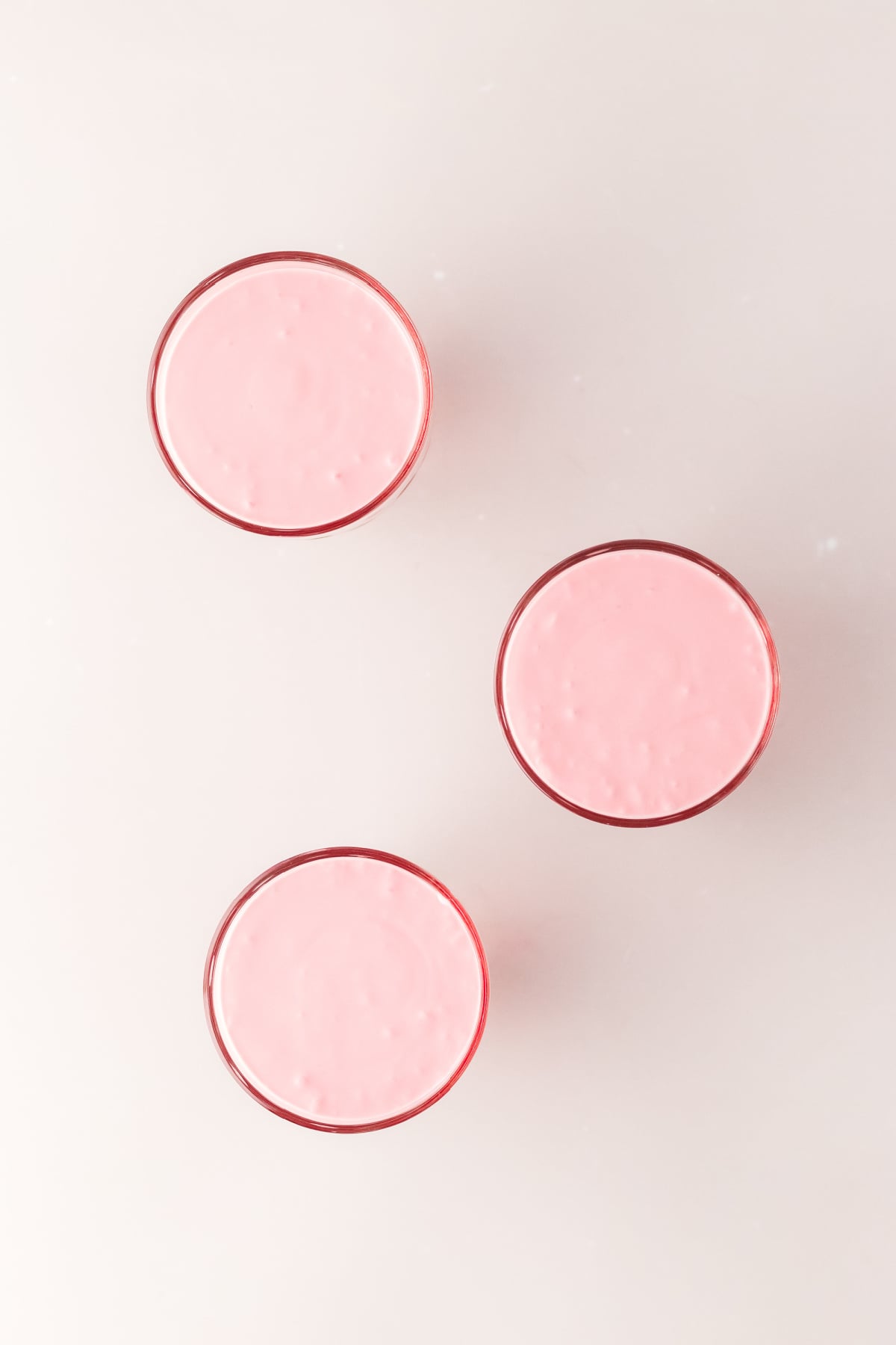 Second or middle creamy layer added to glasses.