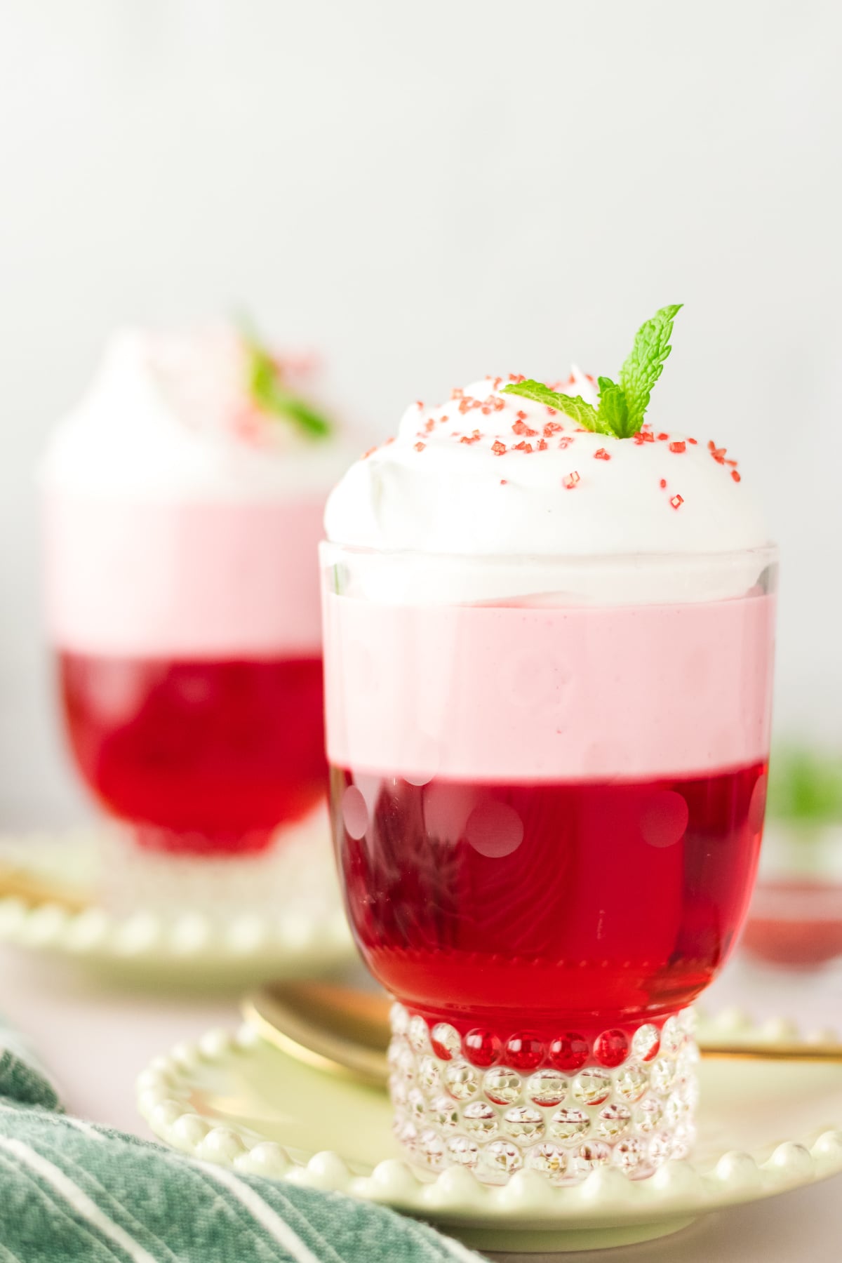 A Jello parfait on a table ready to eat.