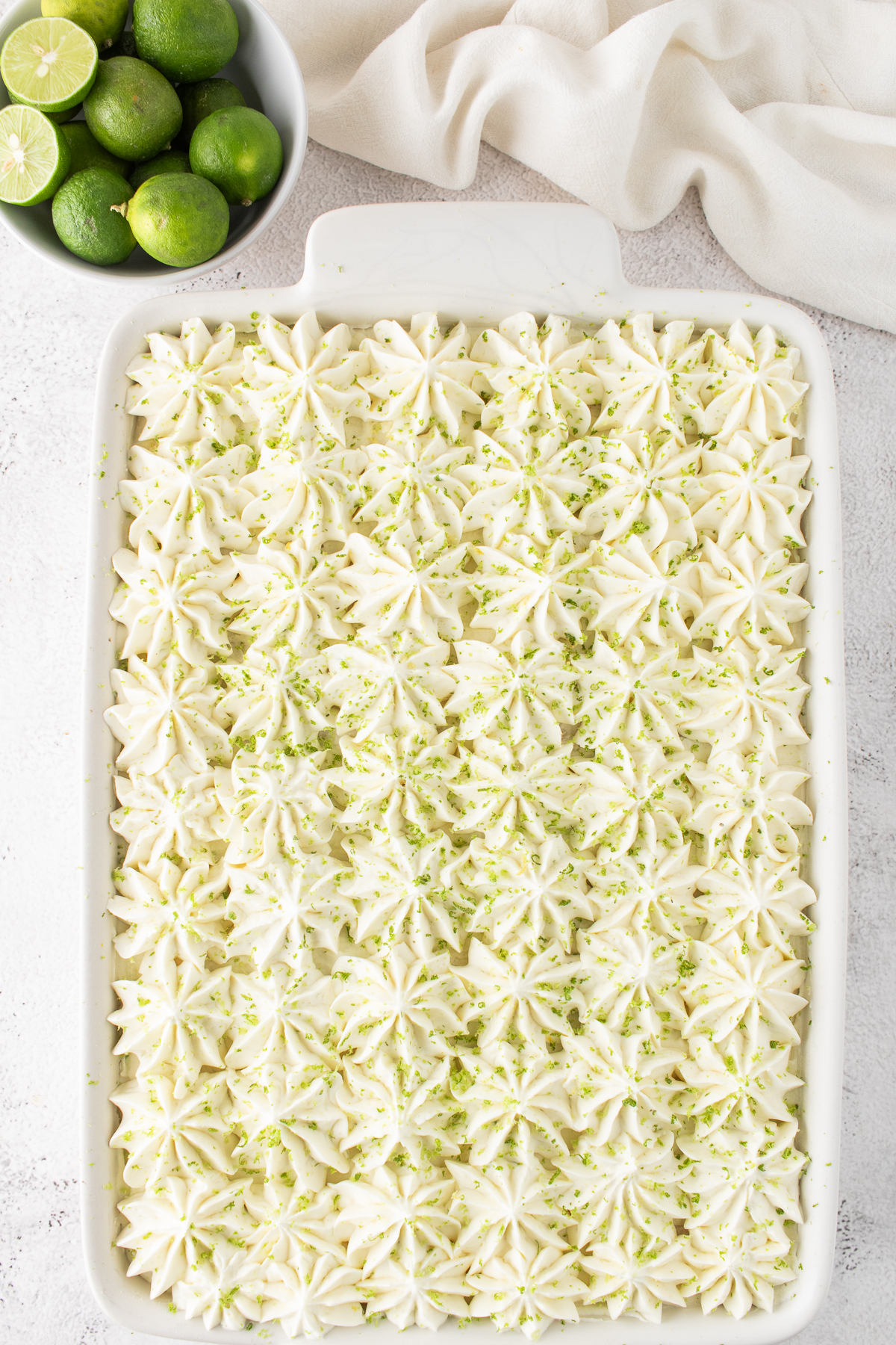 Fresh lime zest on top and chilled.