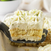Key lime tiramisu scooped out with a spatula.