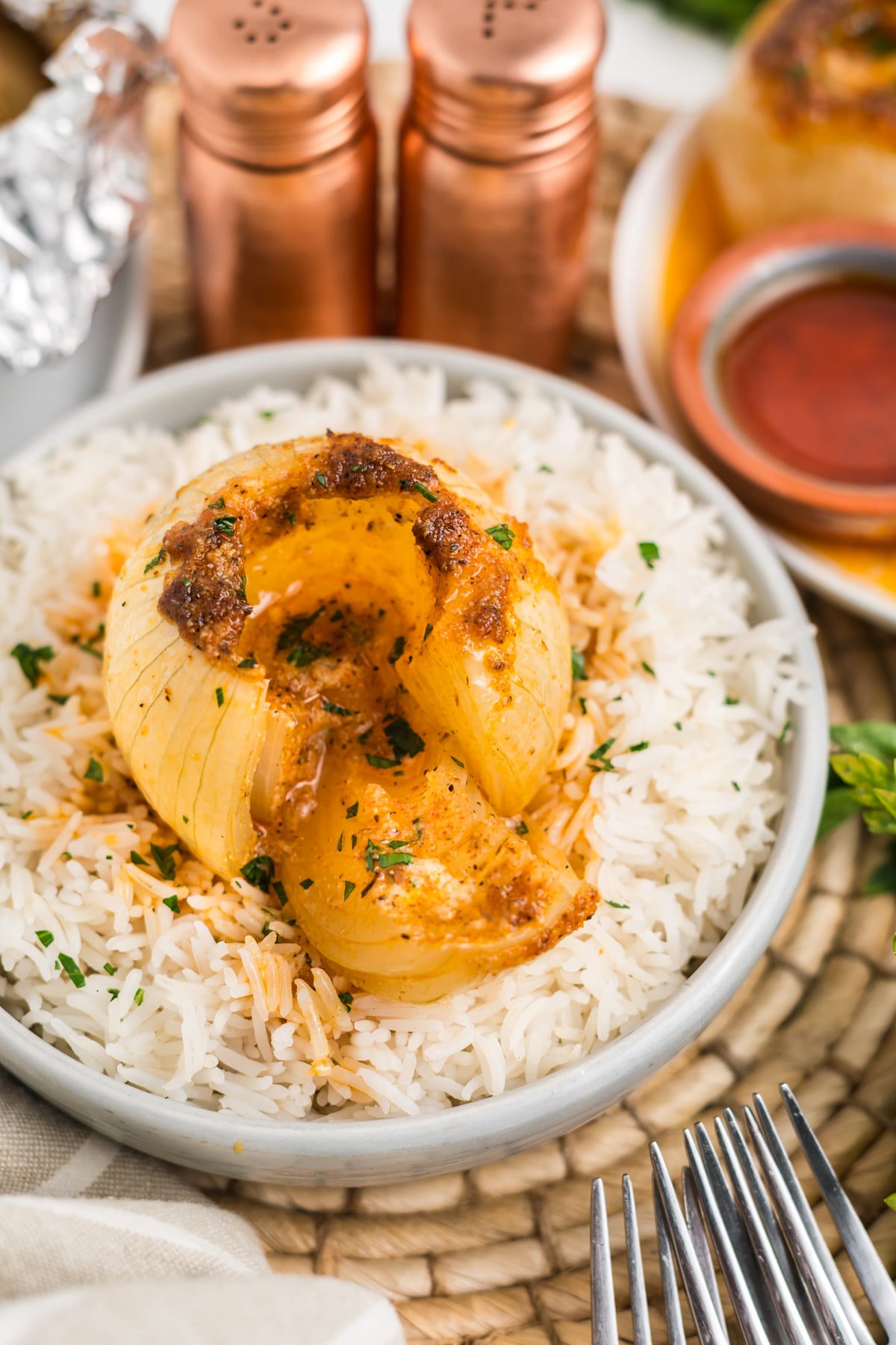 Onion boil recipe on ricw covered plate with side cut open