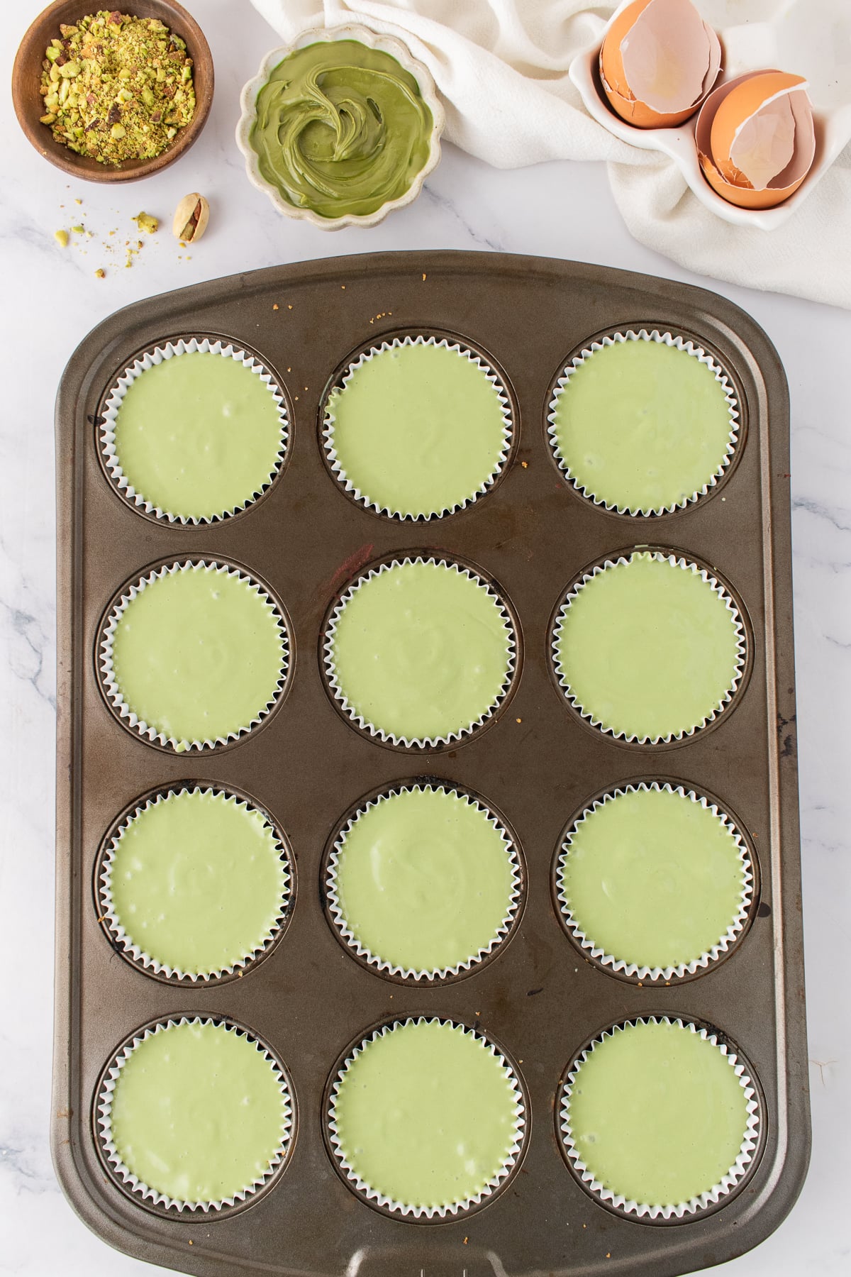 The cheesecakes baked then chilled in a muffin tin.