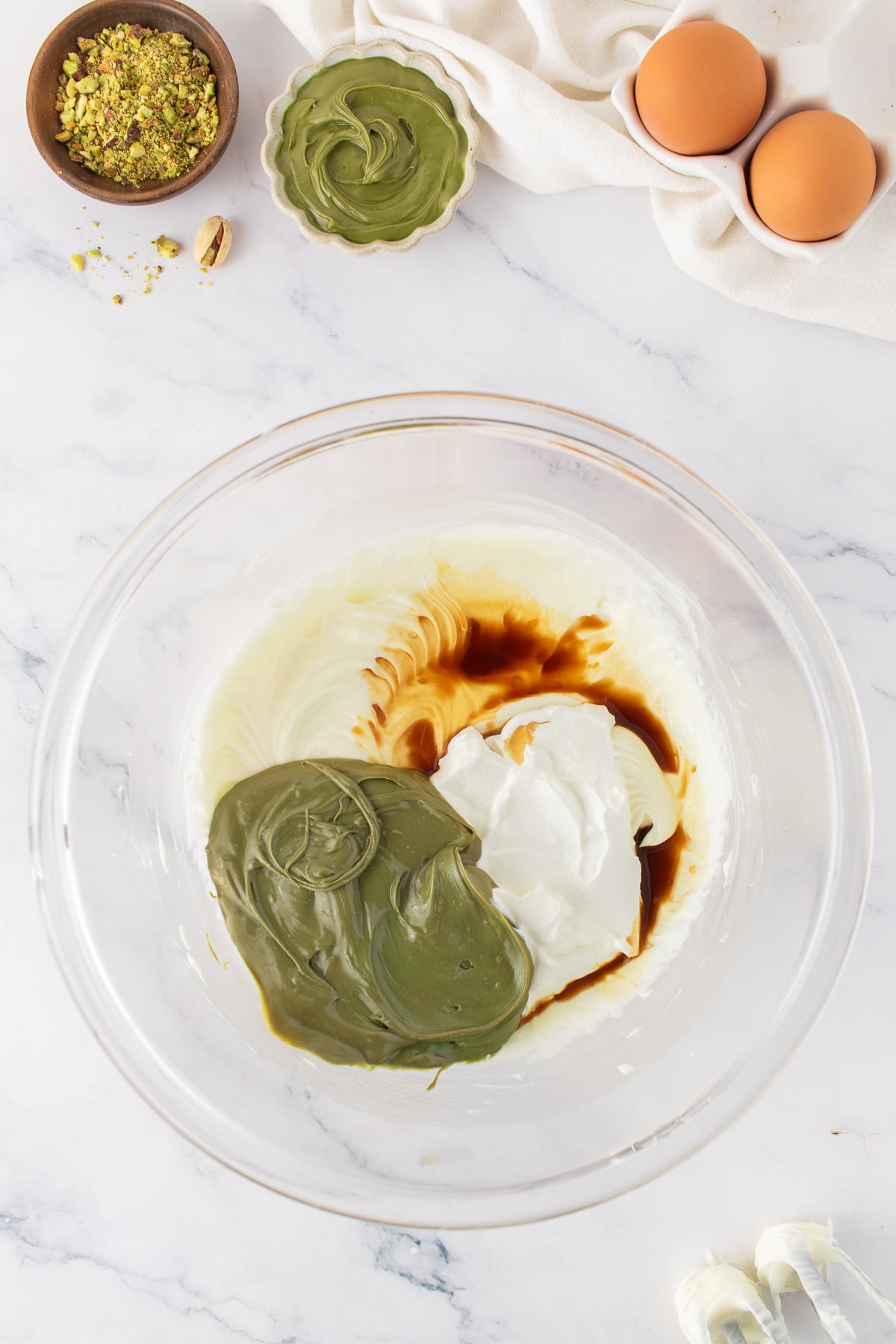 The ingredients for the pistachio cream in a bowl.