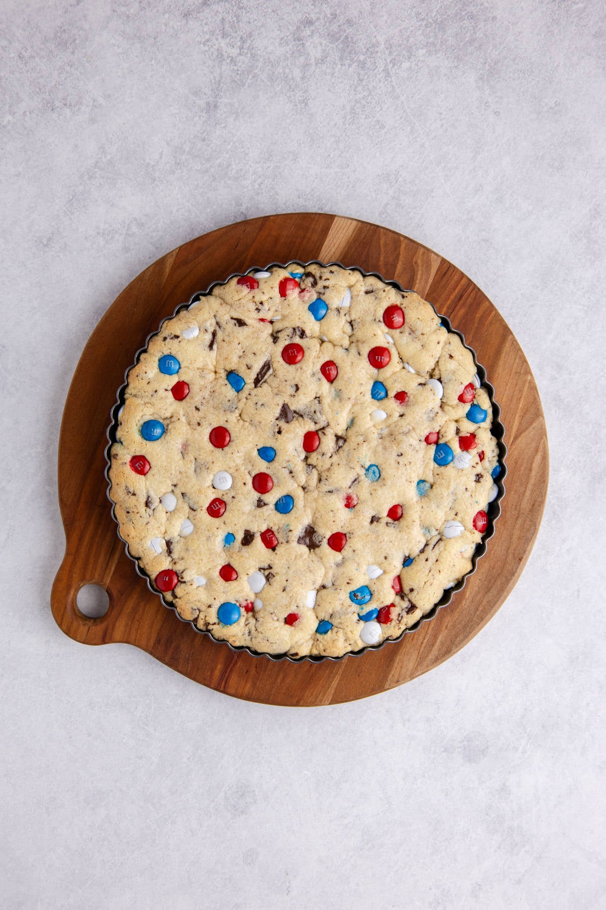 baked cookie cake on a cutting board