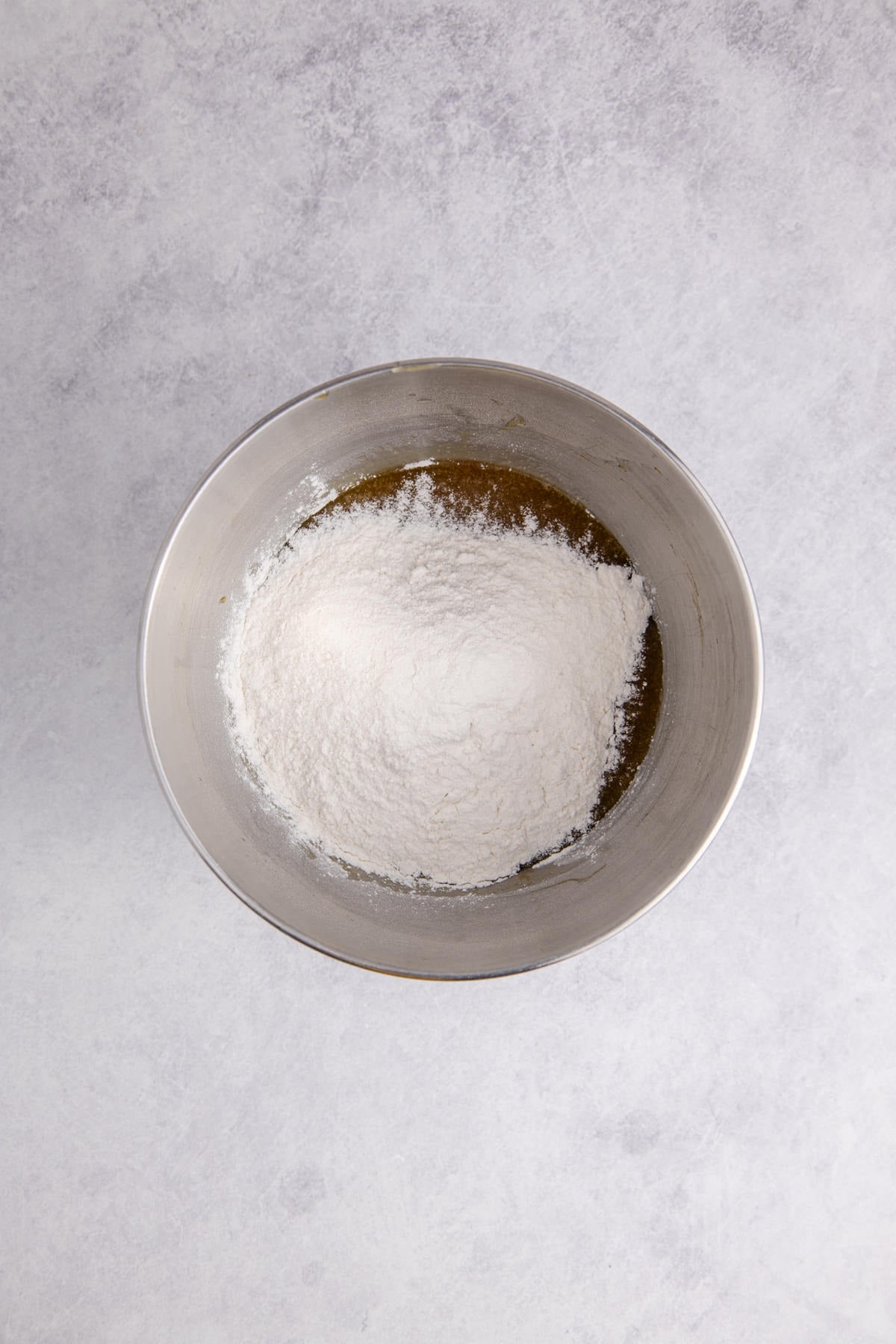 Dry ingredients added to wet ingredients