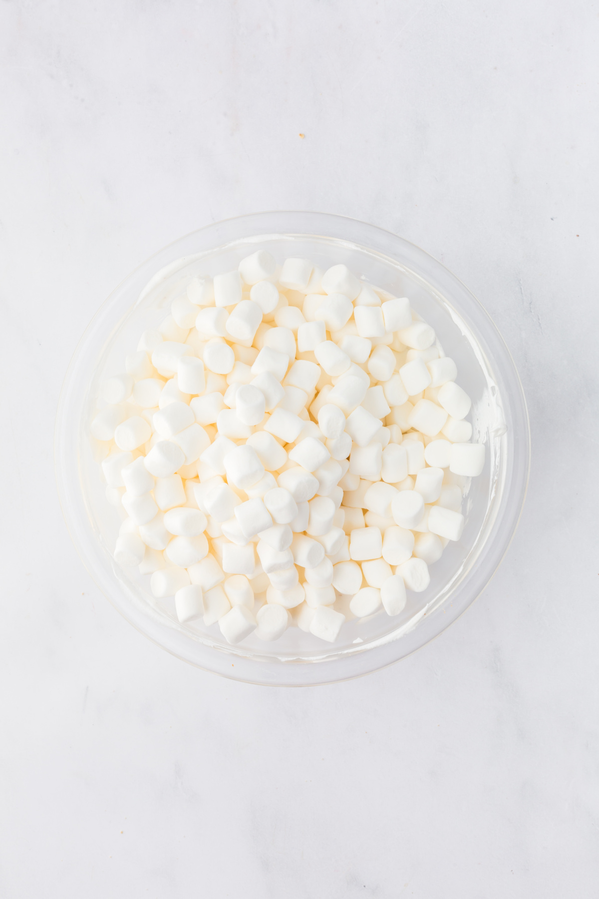Marshmallows are added to mixing bowl.