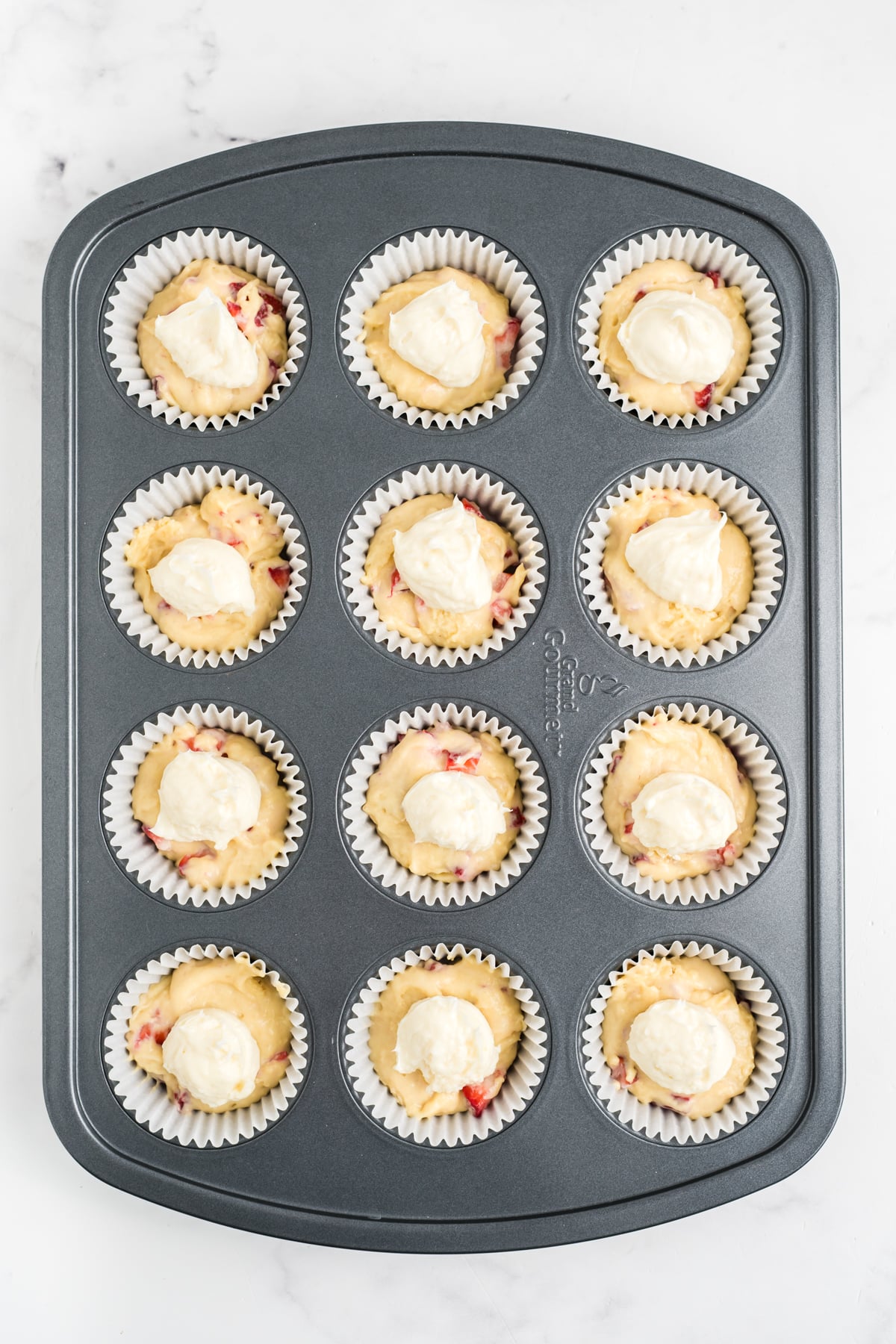 Cream cheese mixture added to each opening. 