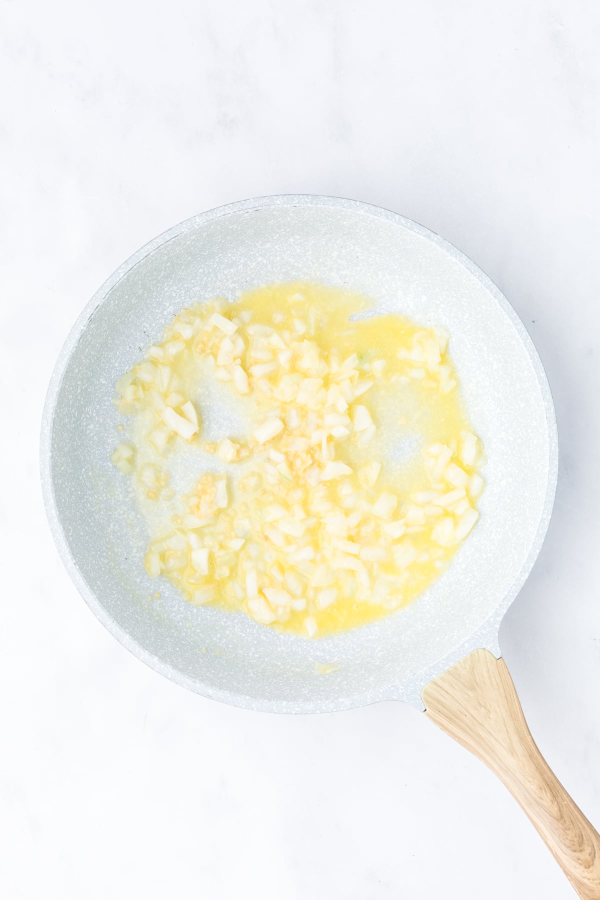 Melted butter with onions and garlic sauteing. 