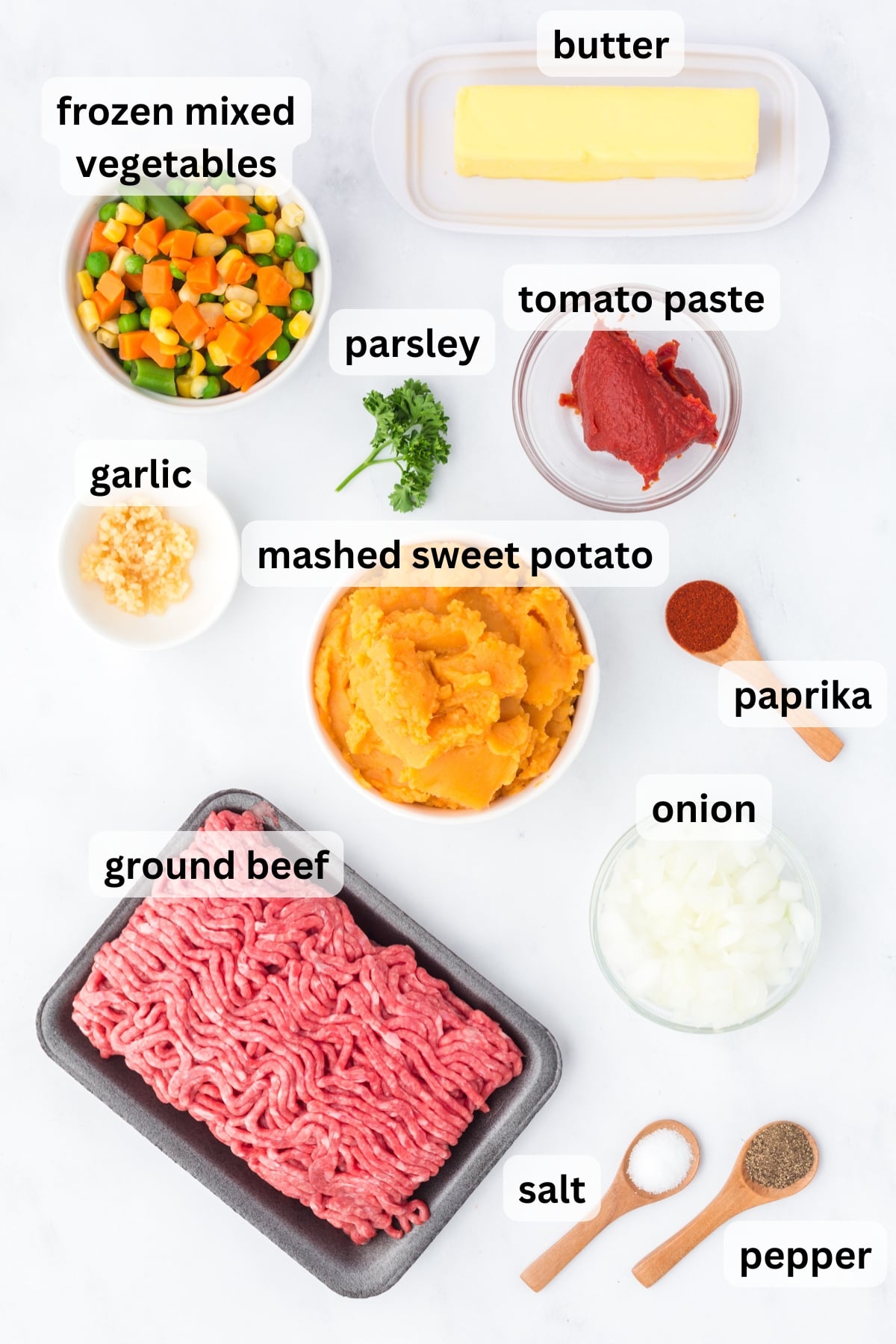 Ingredients to make this shepherd's pie with sweet potatoes on a table.