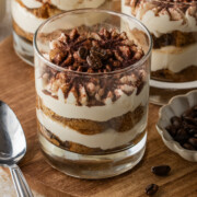 Tiramisu cups on a table.