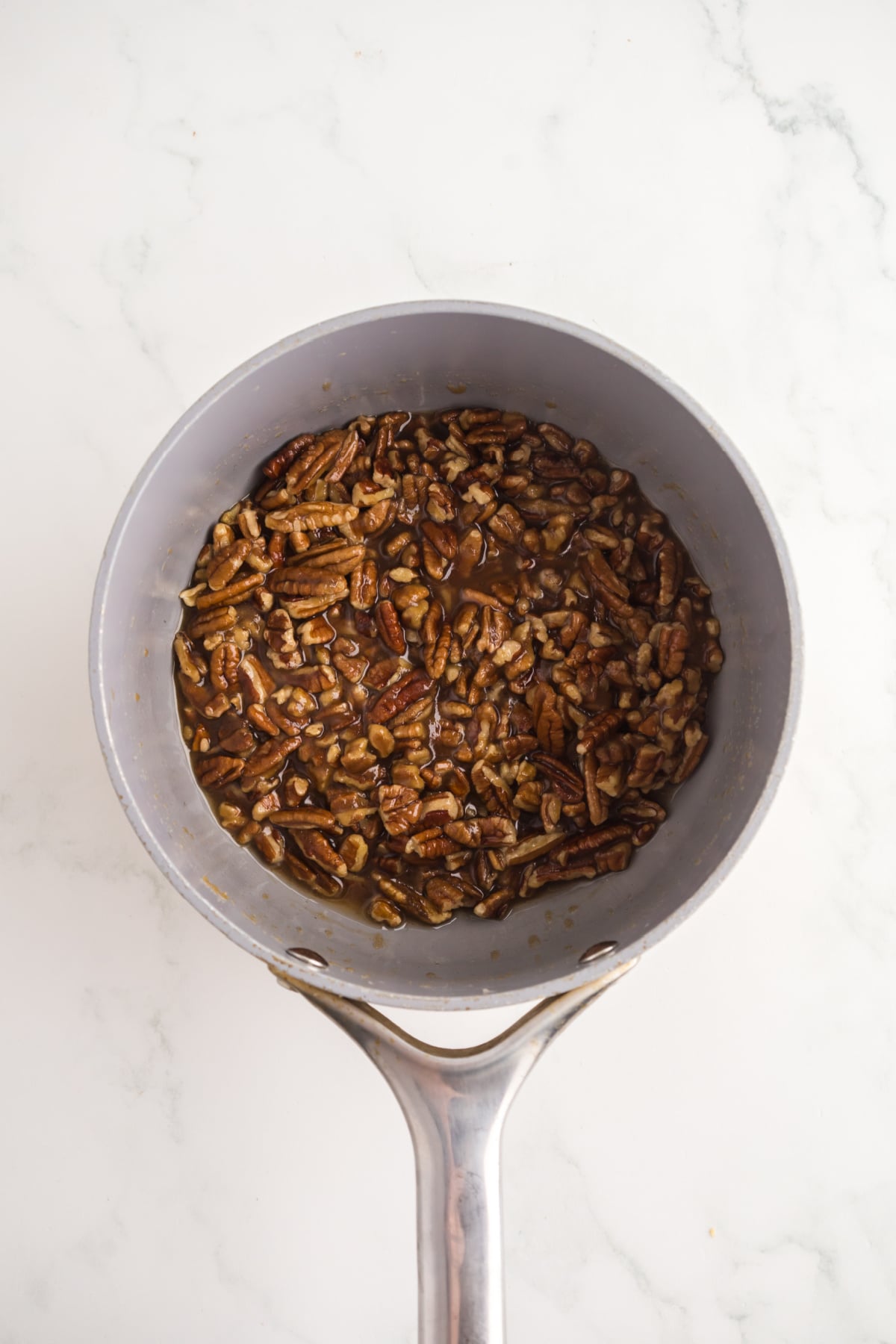 Butter, pecans, brown sugar, and cinnamon in a small pot.