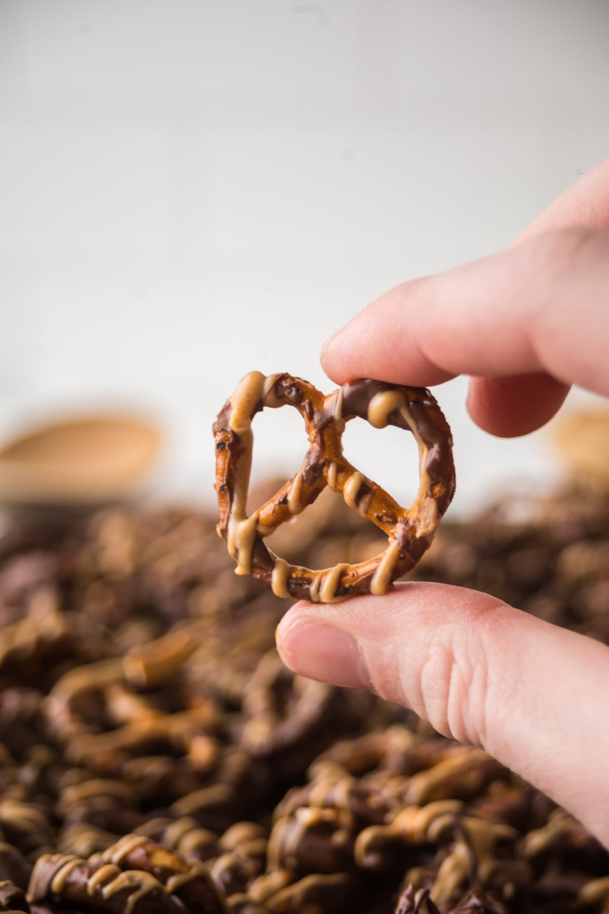 A pretzel held in the air