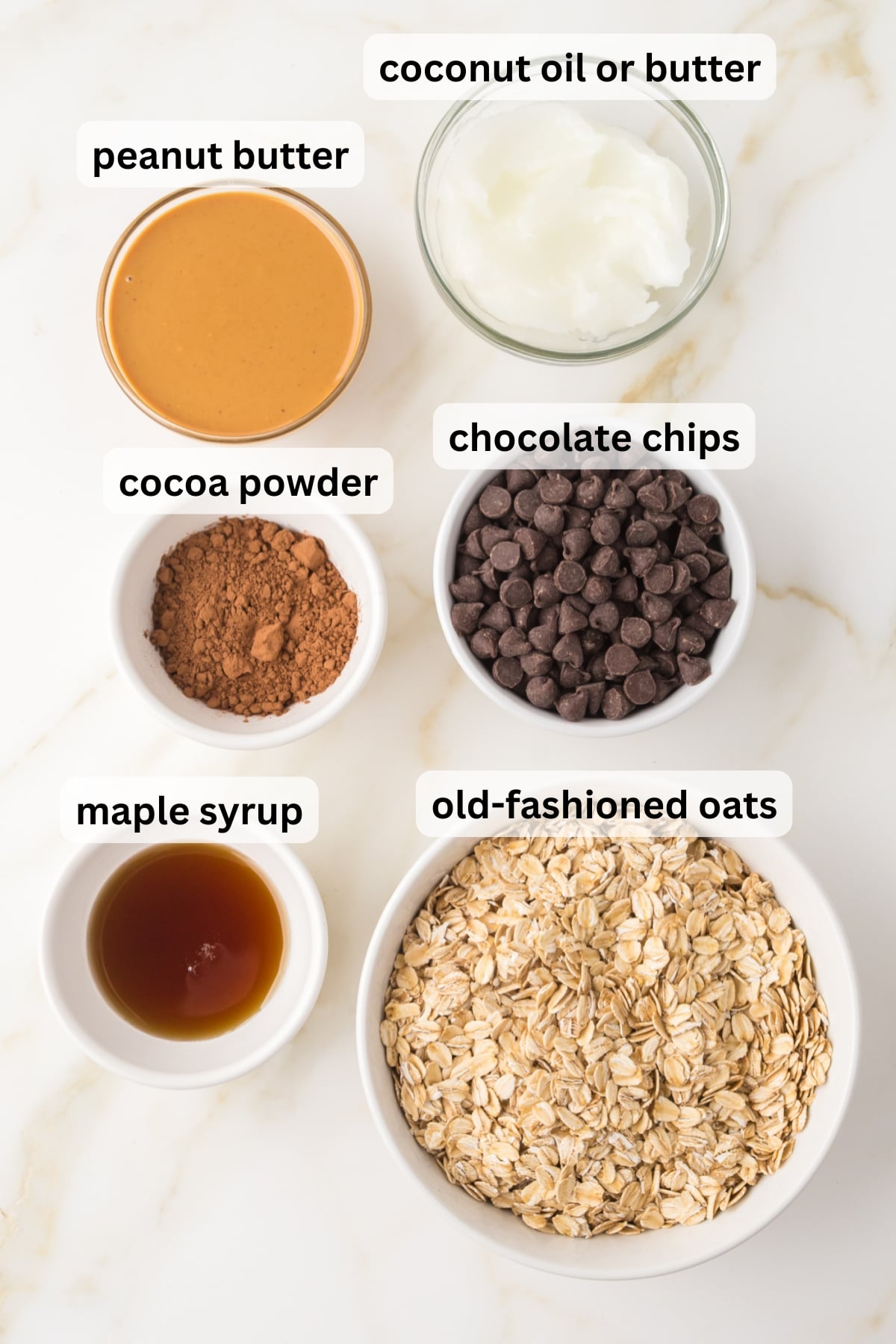 all of the ingredients needed to make peanut butter oatmeal bars in bowls on a table