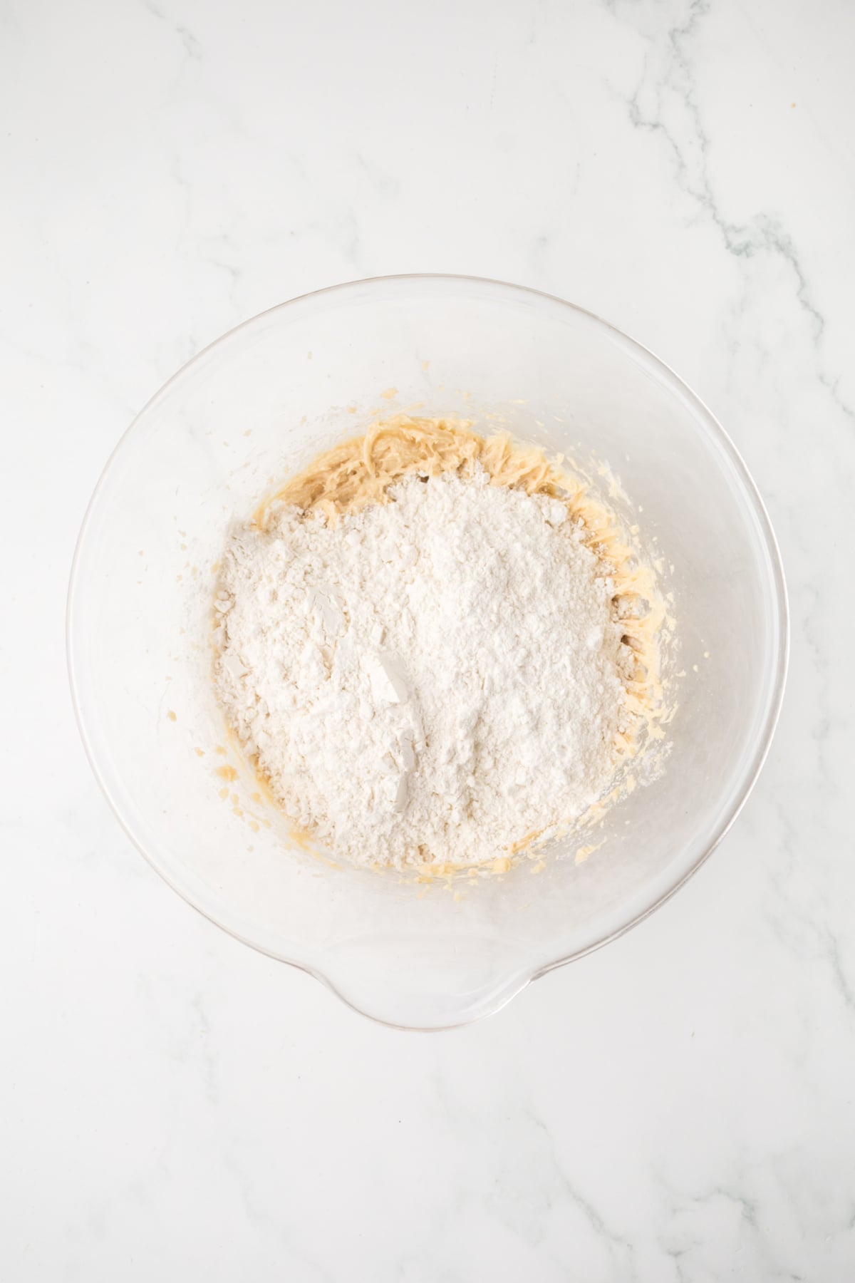The dry ingredients added to the wet ingredients.