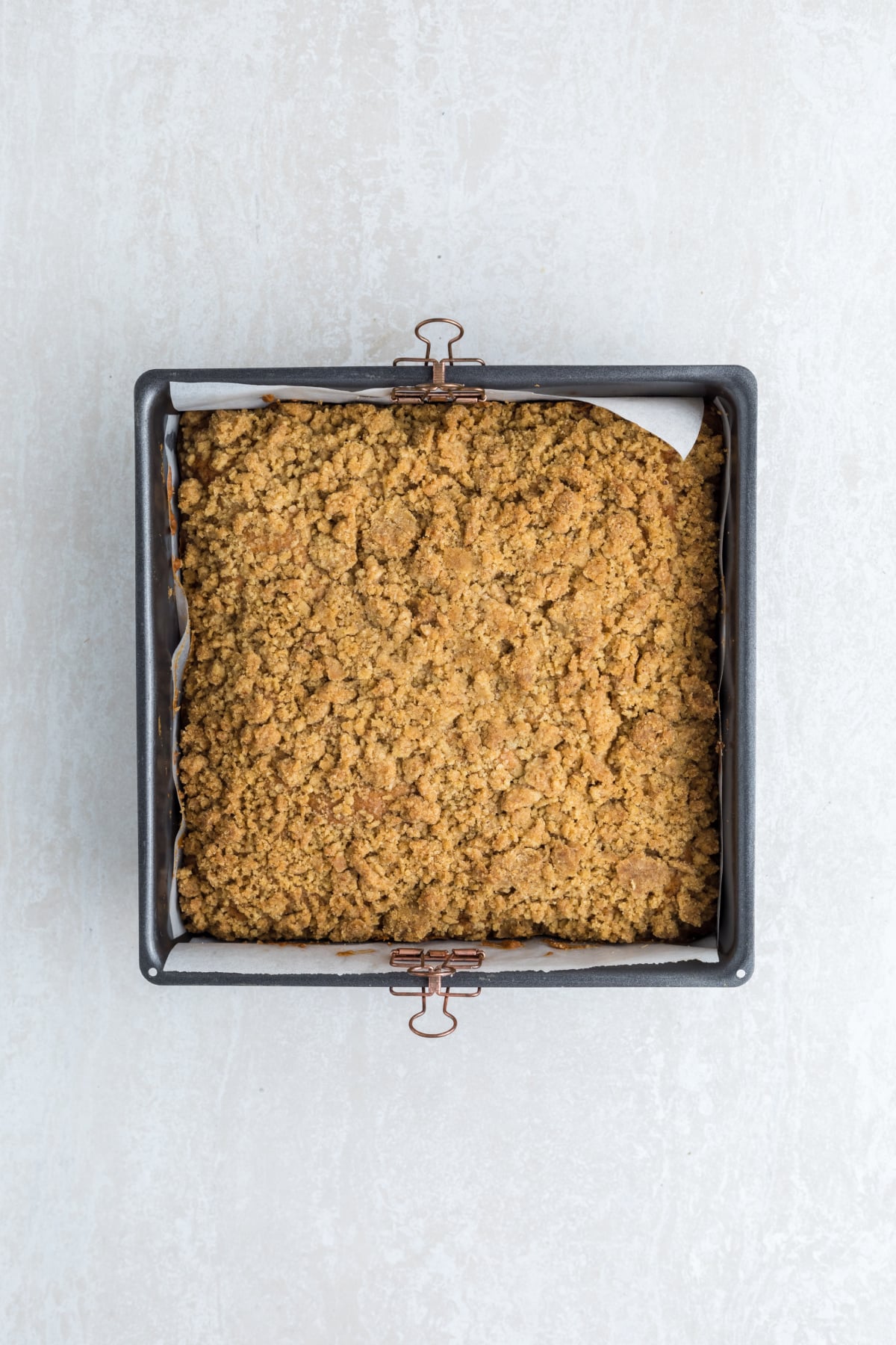 Baked cake fresh out of the oven in the pan.