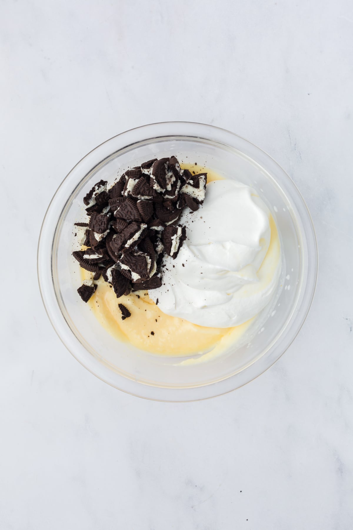 whipped topping and chopped Oreos added to refrigerated cheesecake pudding.