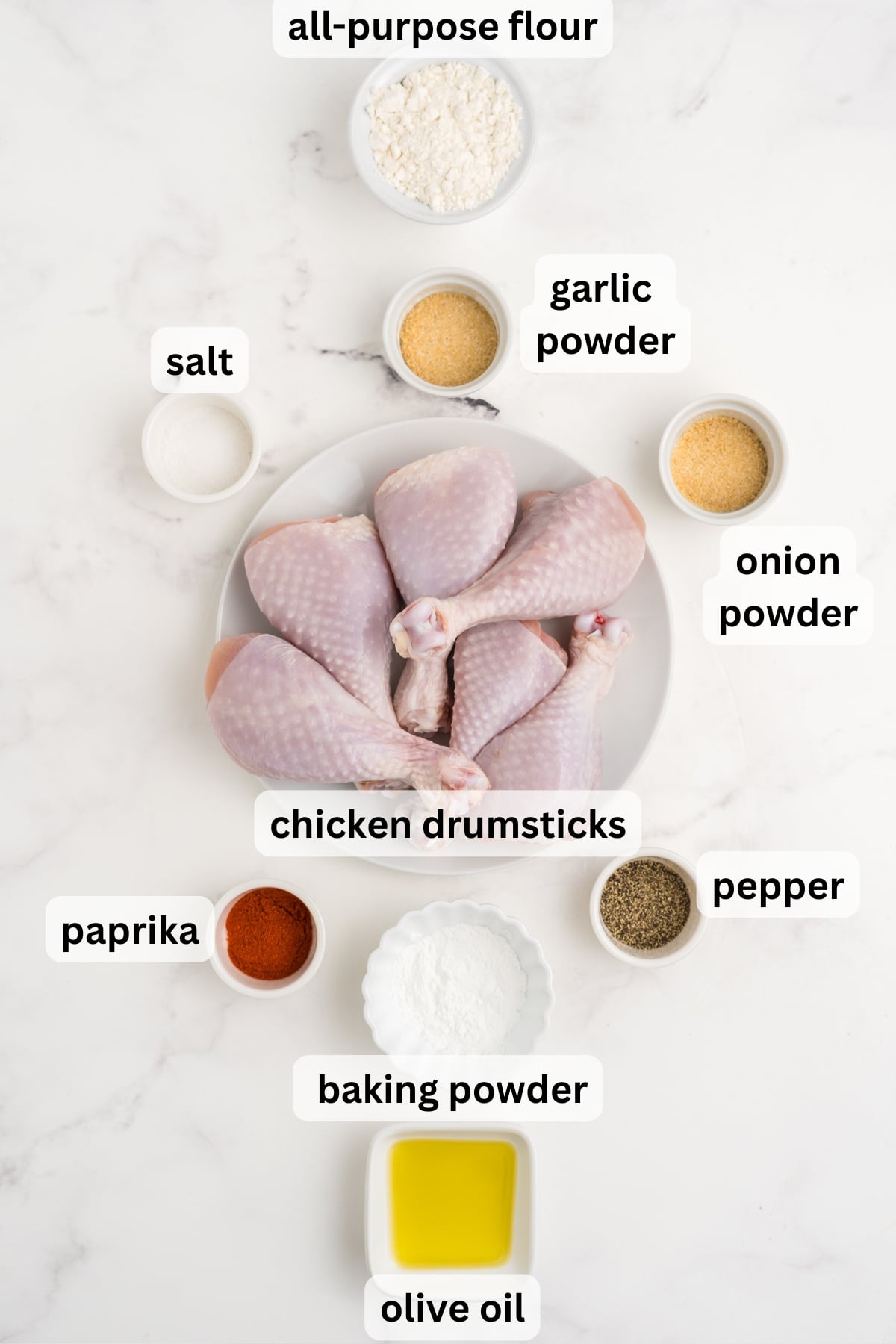 Ingredients to make this baled chicken drumsticks on a table.