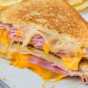 Ham and Cheese Grilled Sandwich cut in half on top of each other.