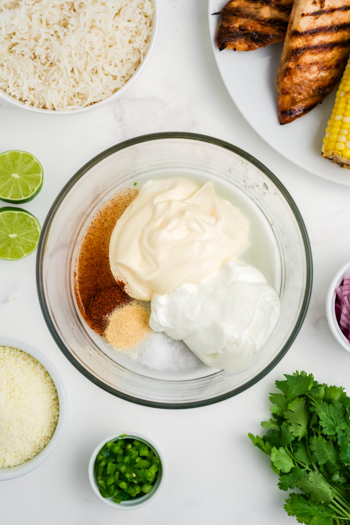 Salad dressing ingredients in a bowl.