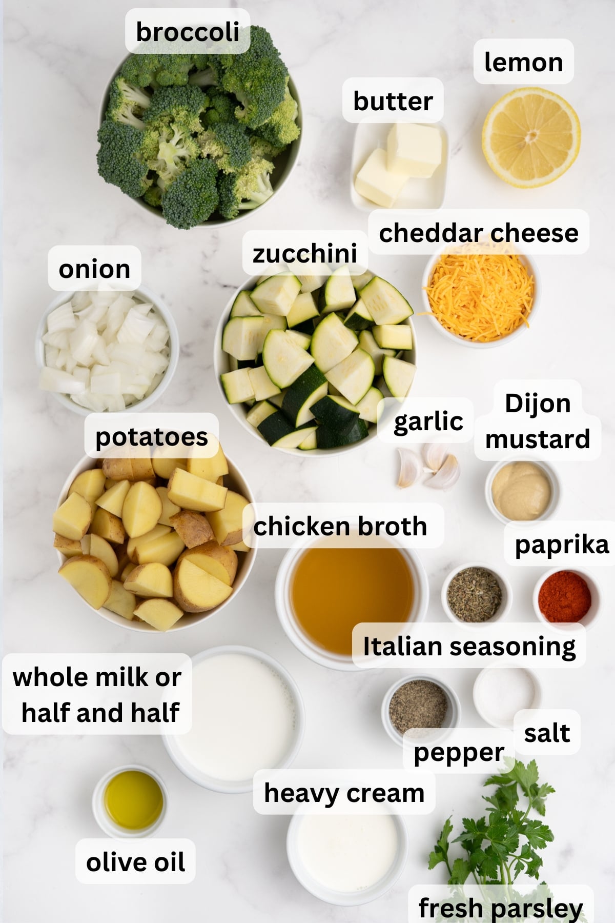 Ingredients to make this soup in bowls on a table.
