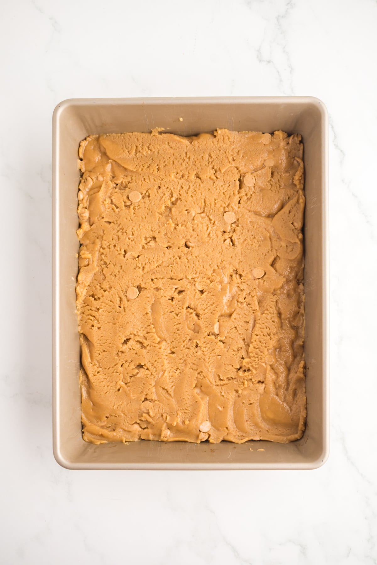 Batter added to 9x13 inch pan.