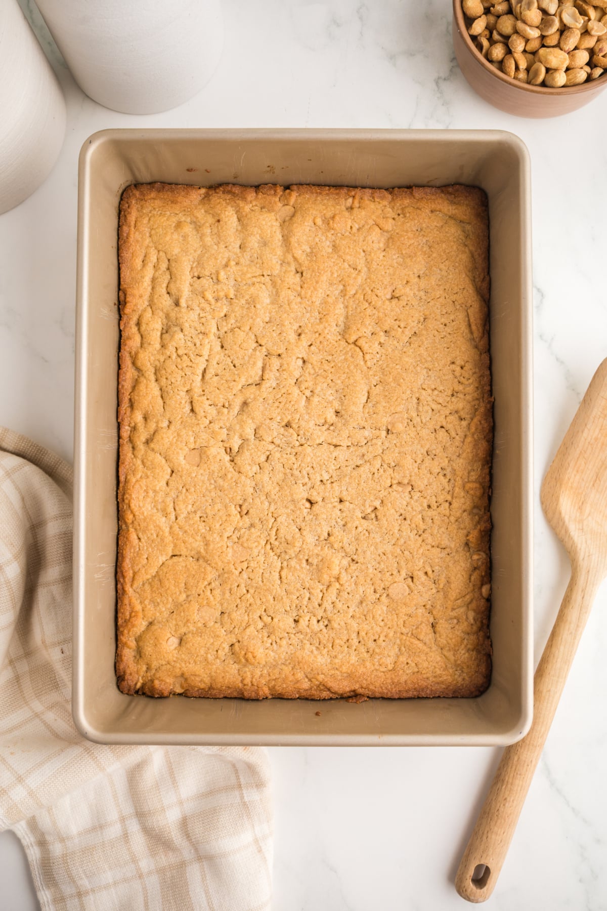 Baked blondies in pan.