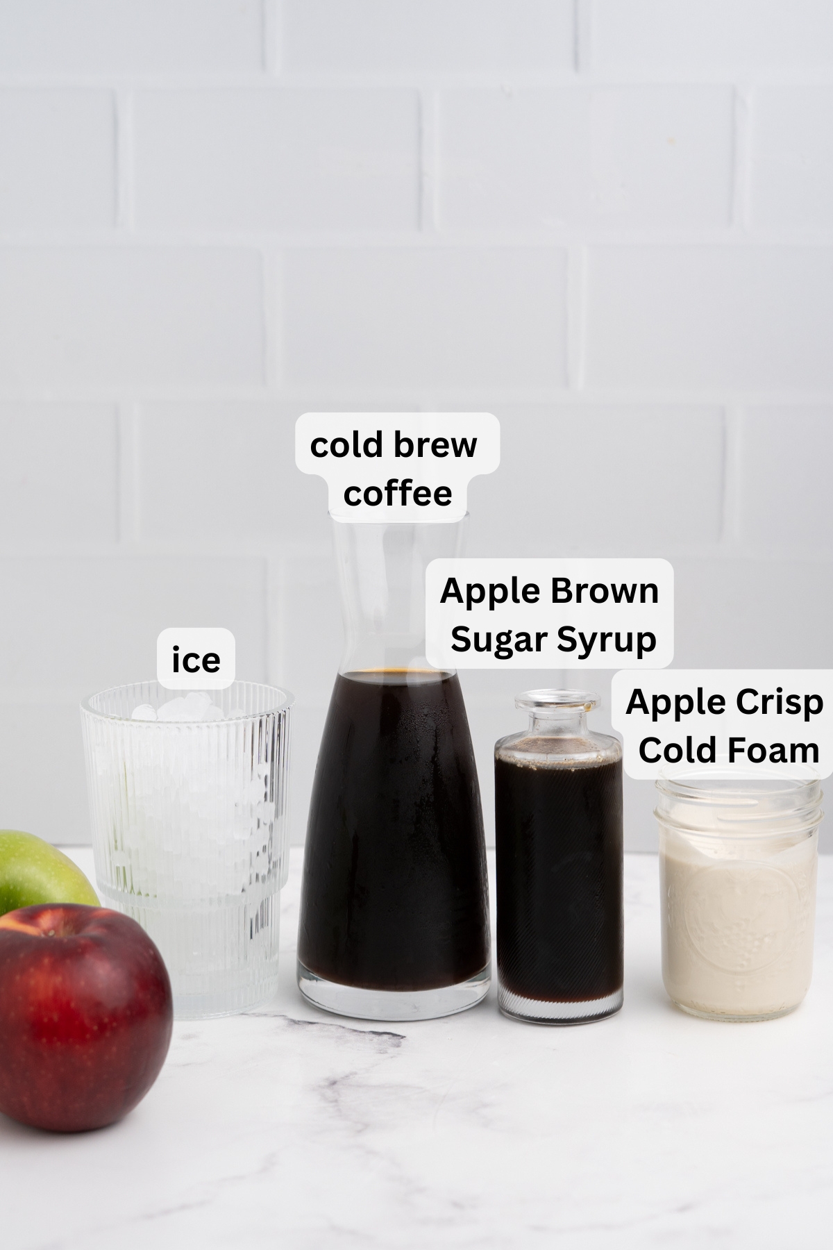 All of the ingredients needed to make Apple Crisp Cold Brew on a table.