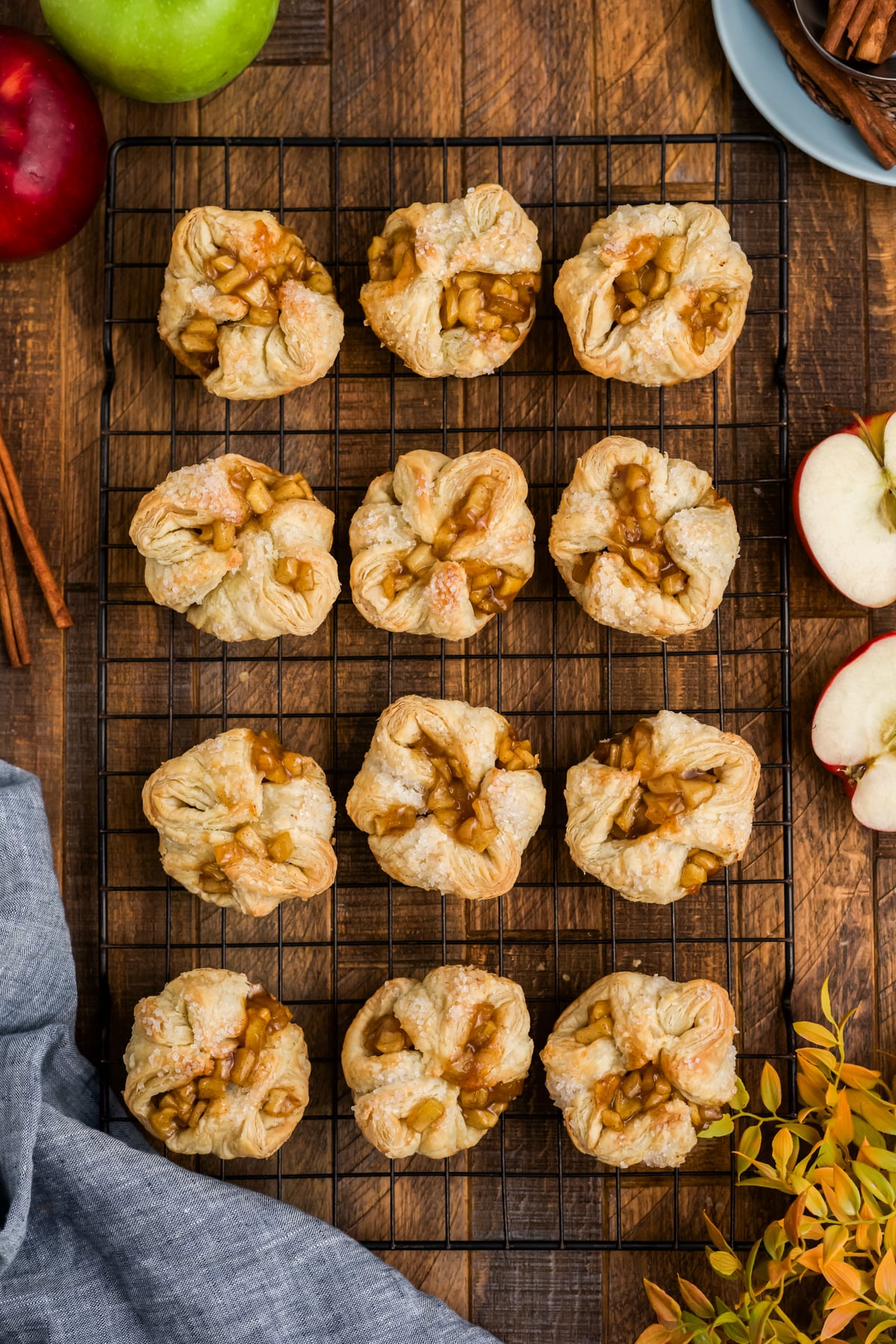 Freshly baked croissants cooling on a rack.