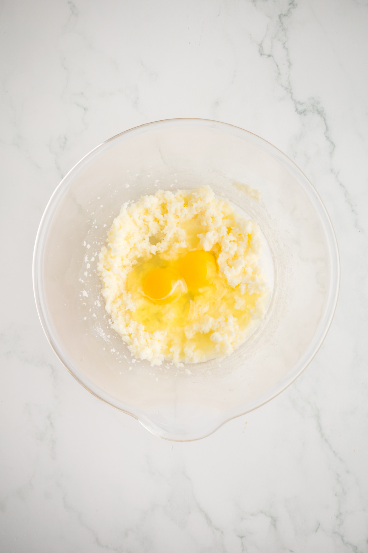 Wet ingredients for batter in mixing bowl.