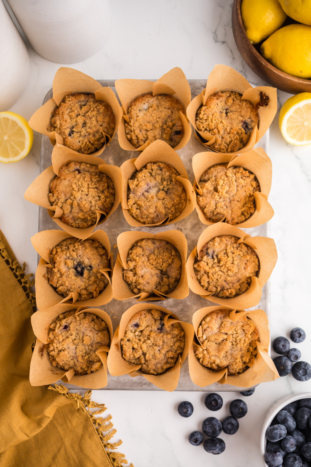Baked muffins cooling in pan.