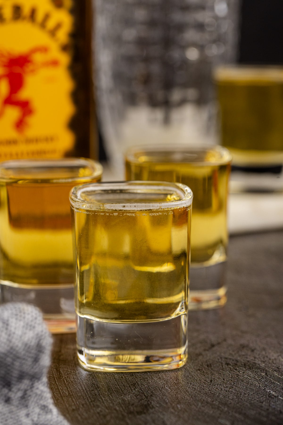 Three shots on a table.