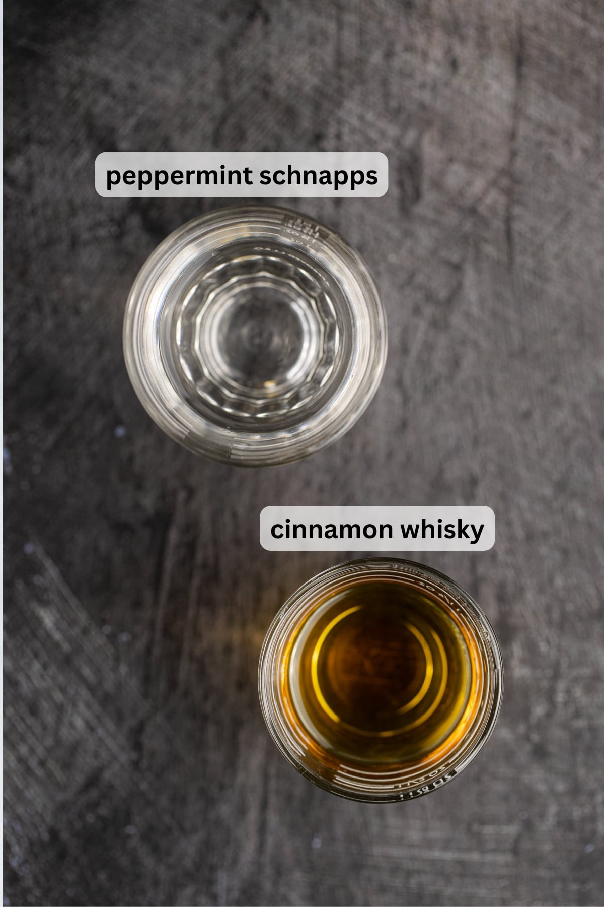 All of the ingredients needed to make a Fire and Ice Shot on a table.