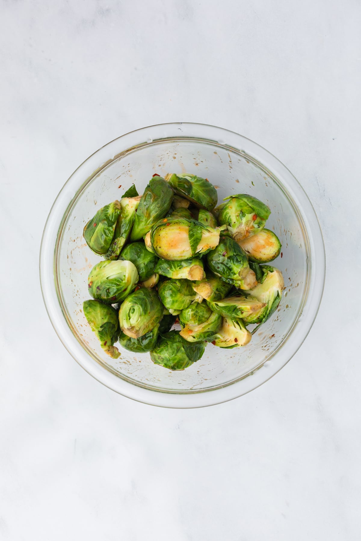 Hot honey glaze coating the Brussels sprouts.