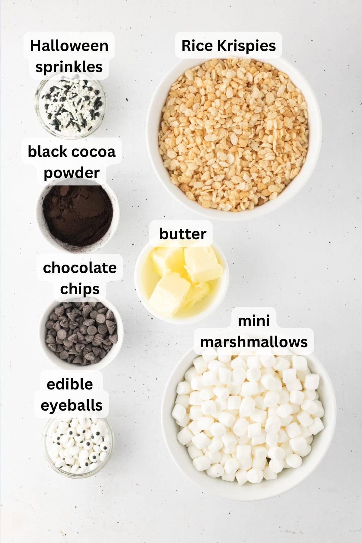 Rice Krispie Ghosts Treats ingredients arranged on a countertop in bowls.