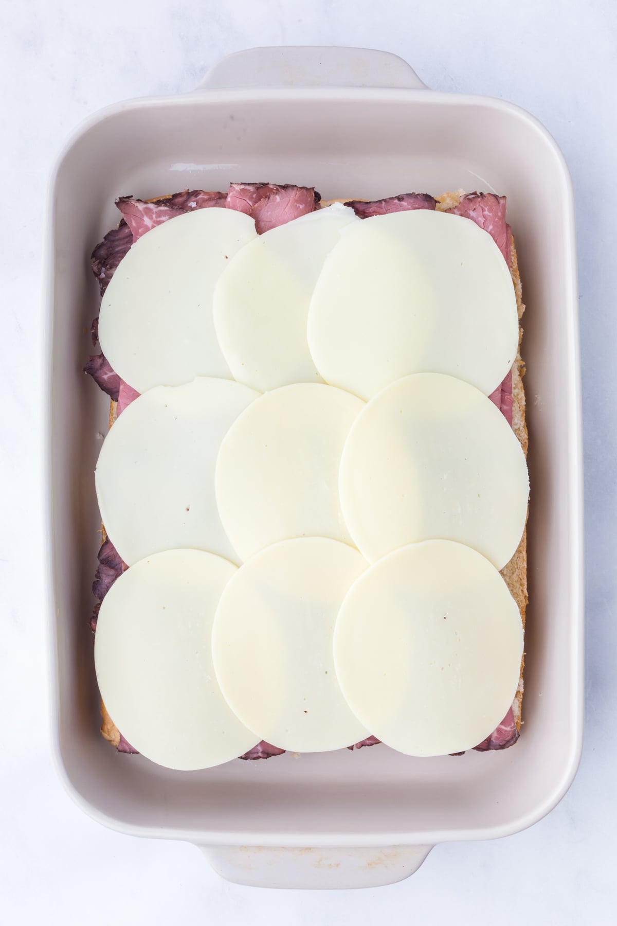 Optional cheese layer added on top of roast beef.