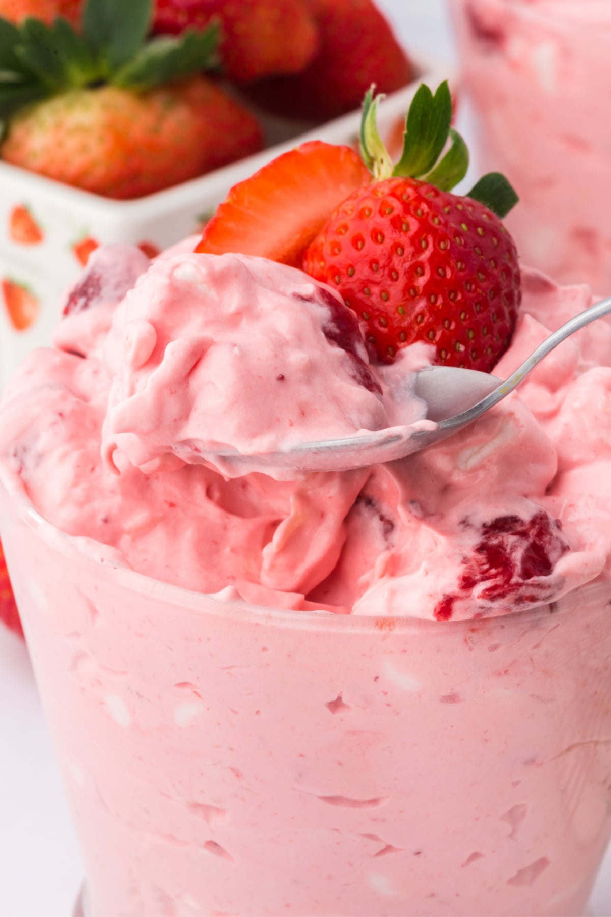 A spoonful of fluff lifted out of the glassful.