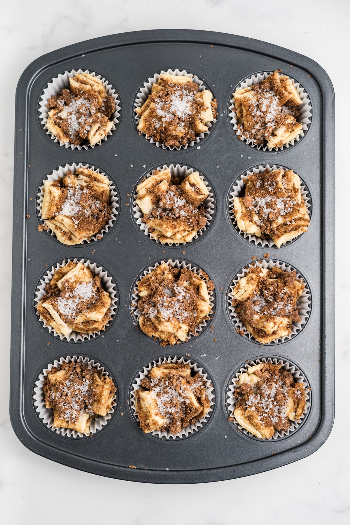 Pull-aparts topped with streusel and coarse sugar before baking.