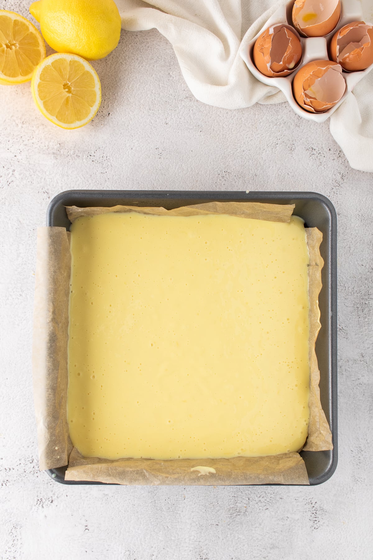 Baked lemon bars in pan cooling.
