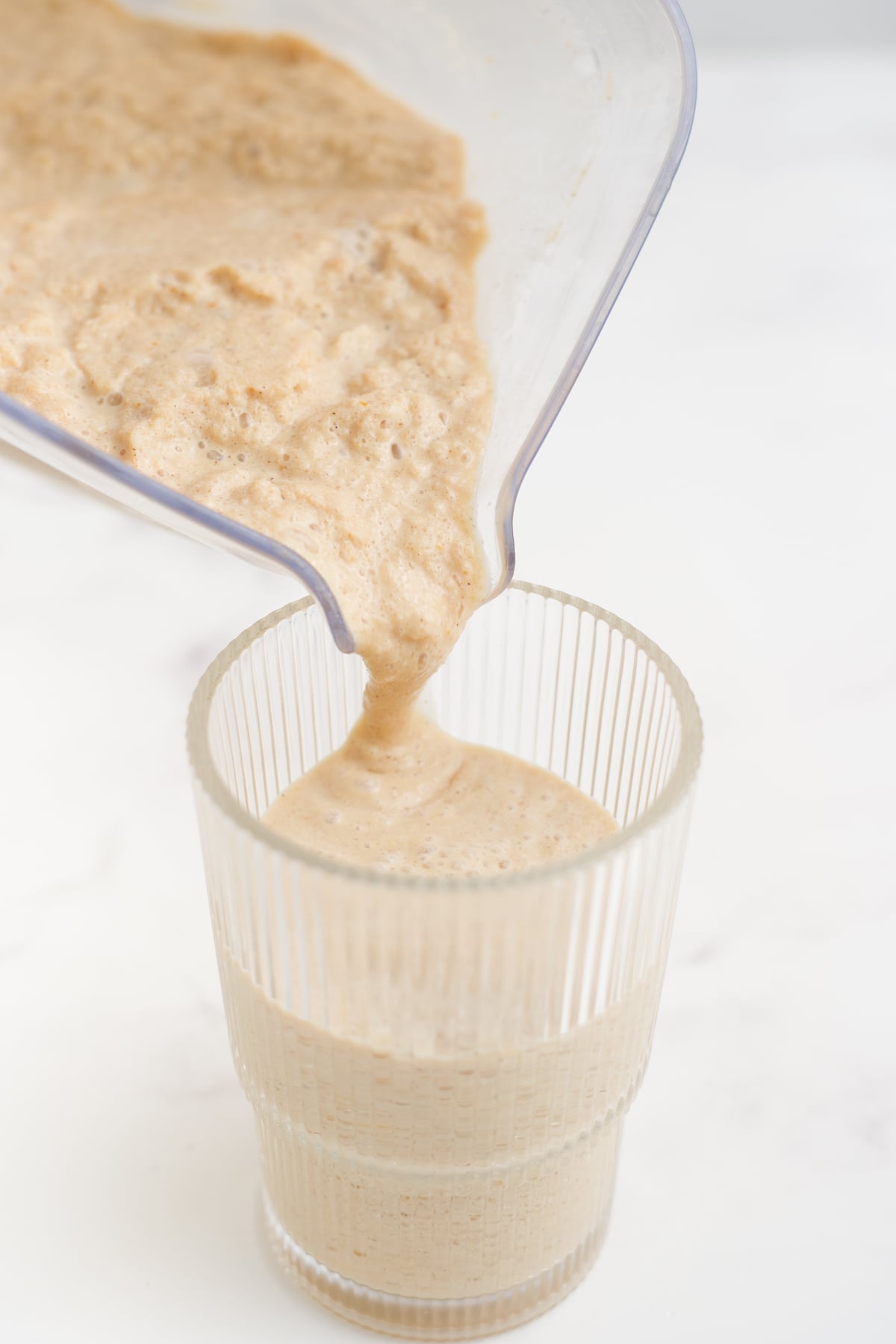 Frappuccino blended with ice and poured into a glass.