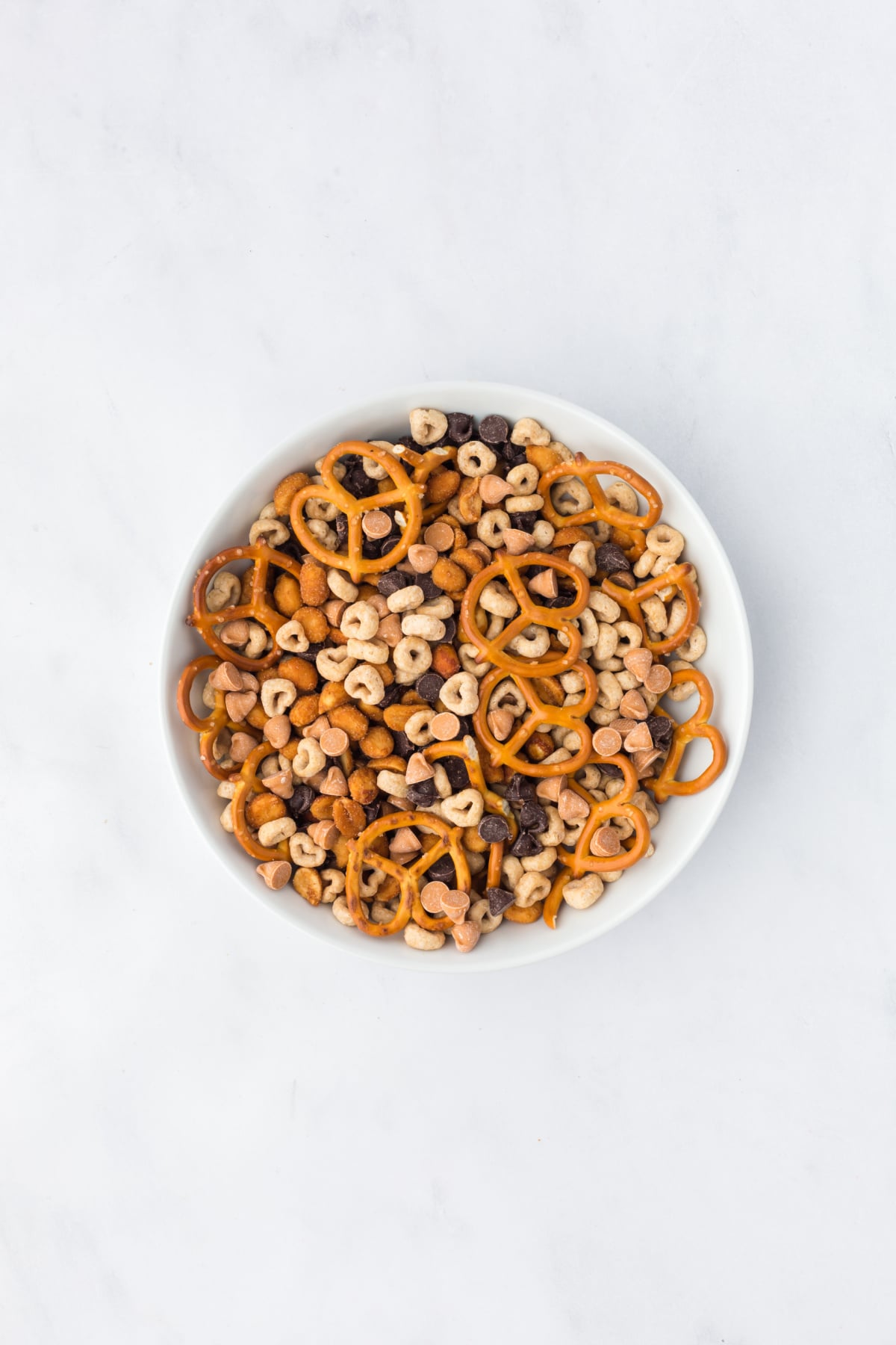 All of the ingredients tossed until evenly distributed in mixing bowl.