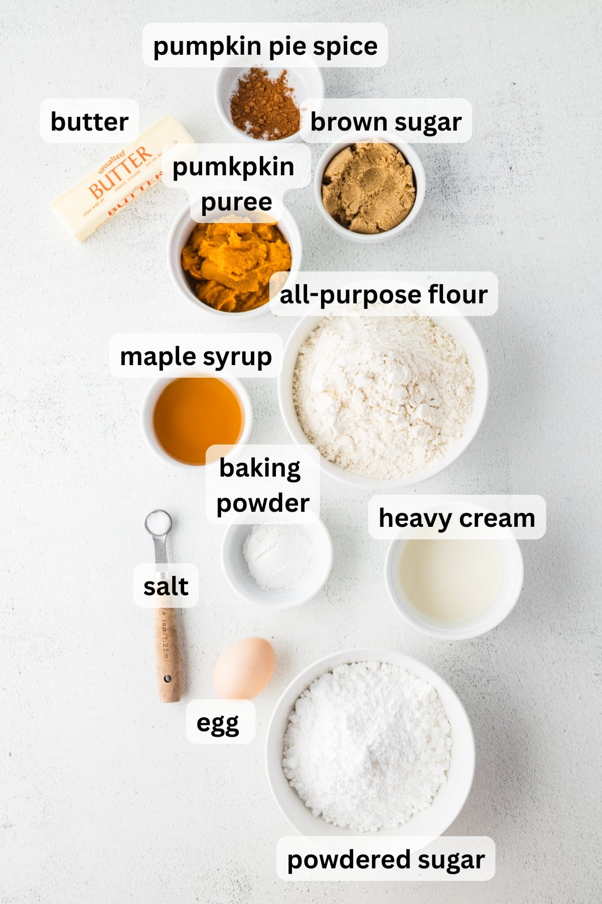 All of the ingredients needed to make pumpkin scones at Starbucks in bowls on a table.