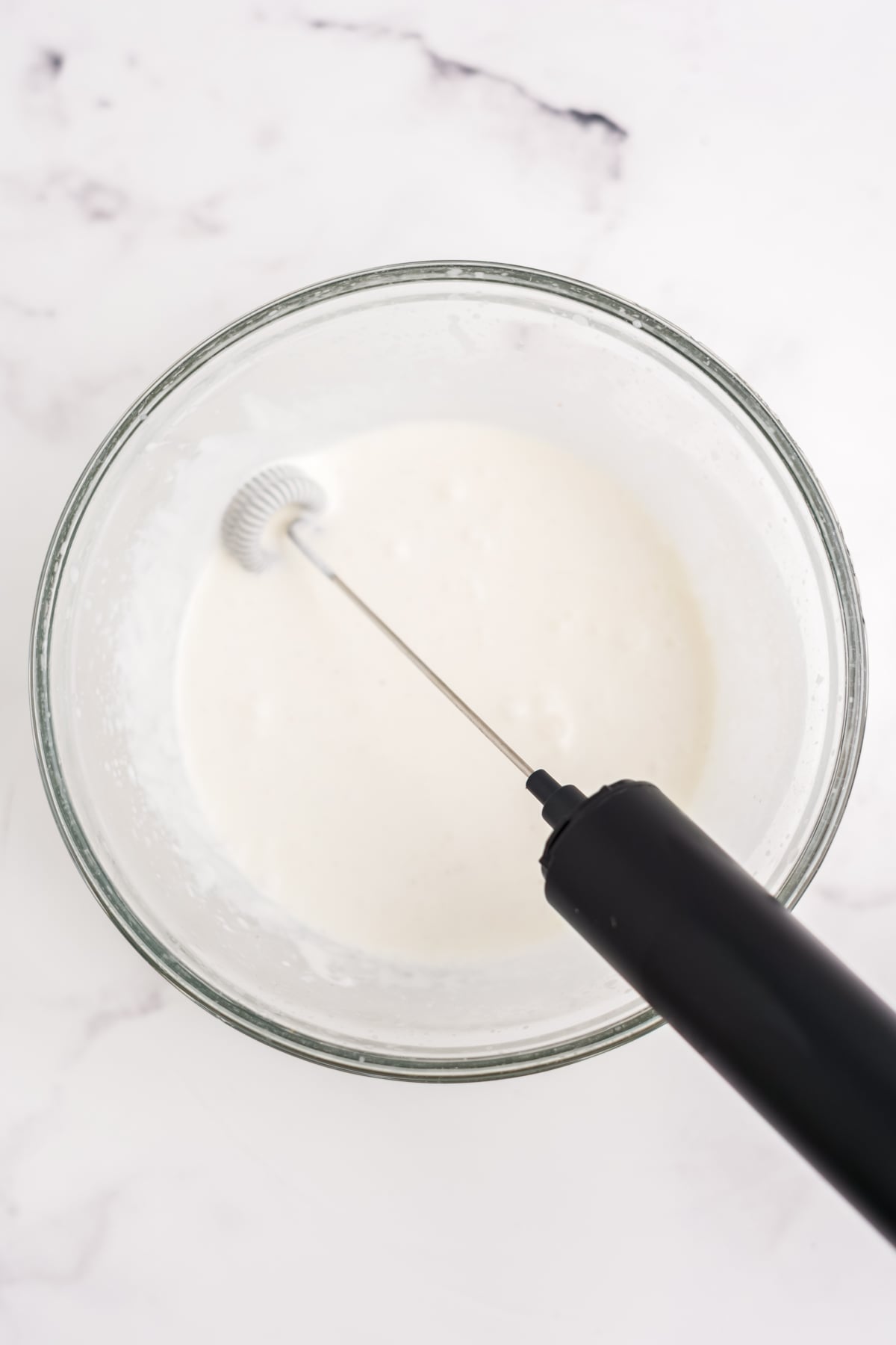 Cold foam is thick and creamy and ready to add to cold coffee.