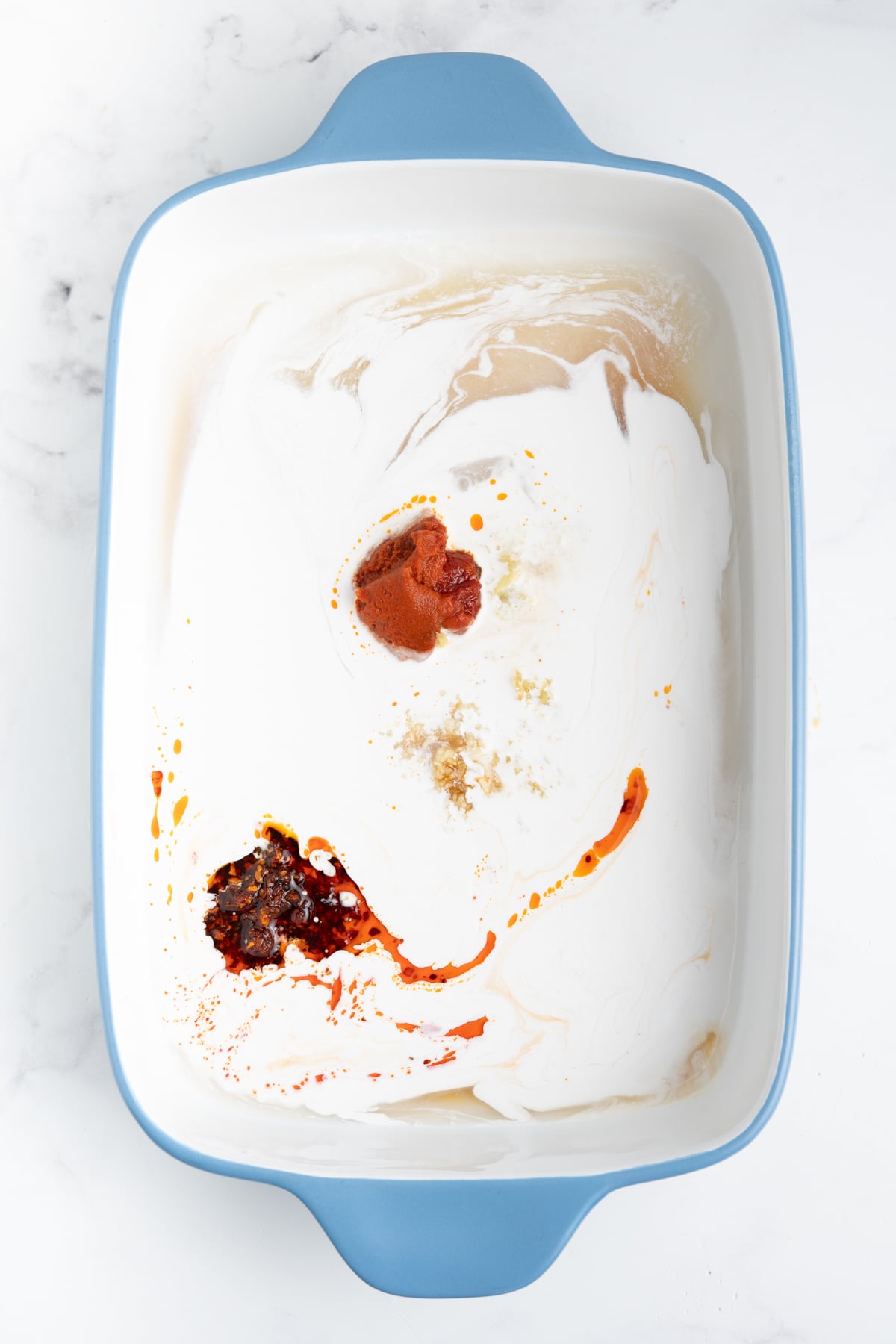 Ingredients added to baking dish.