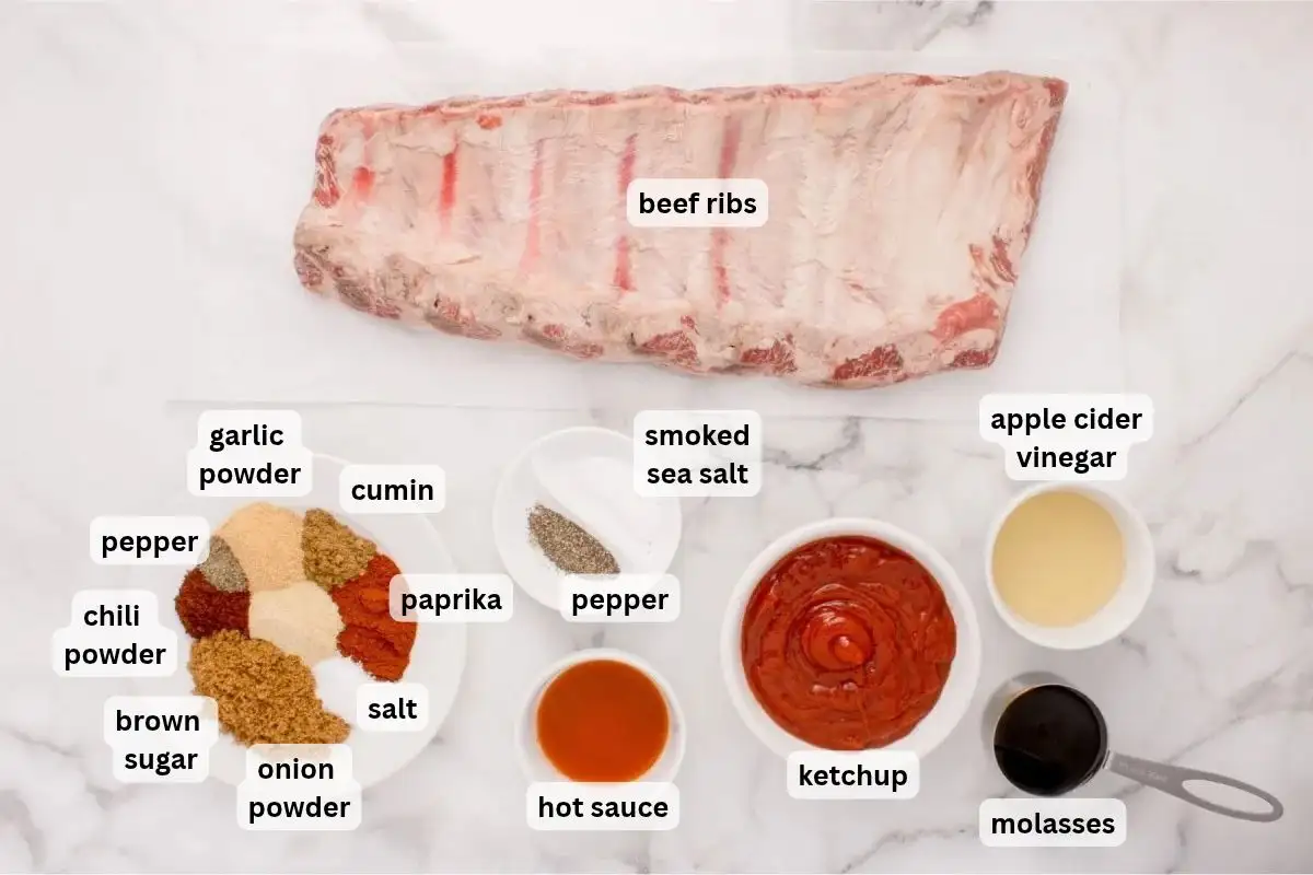 All the ingredients needed to make Beef Ribs Recipe (Oven Baked) in bowls on a table.