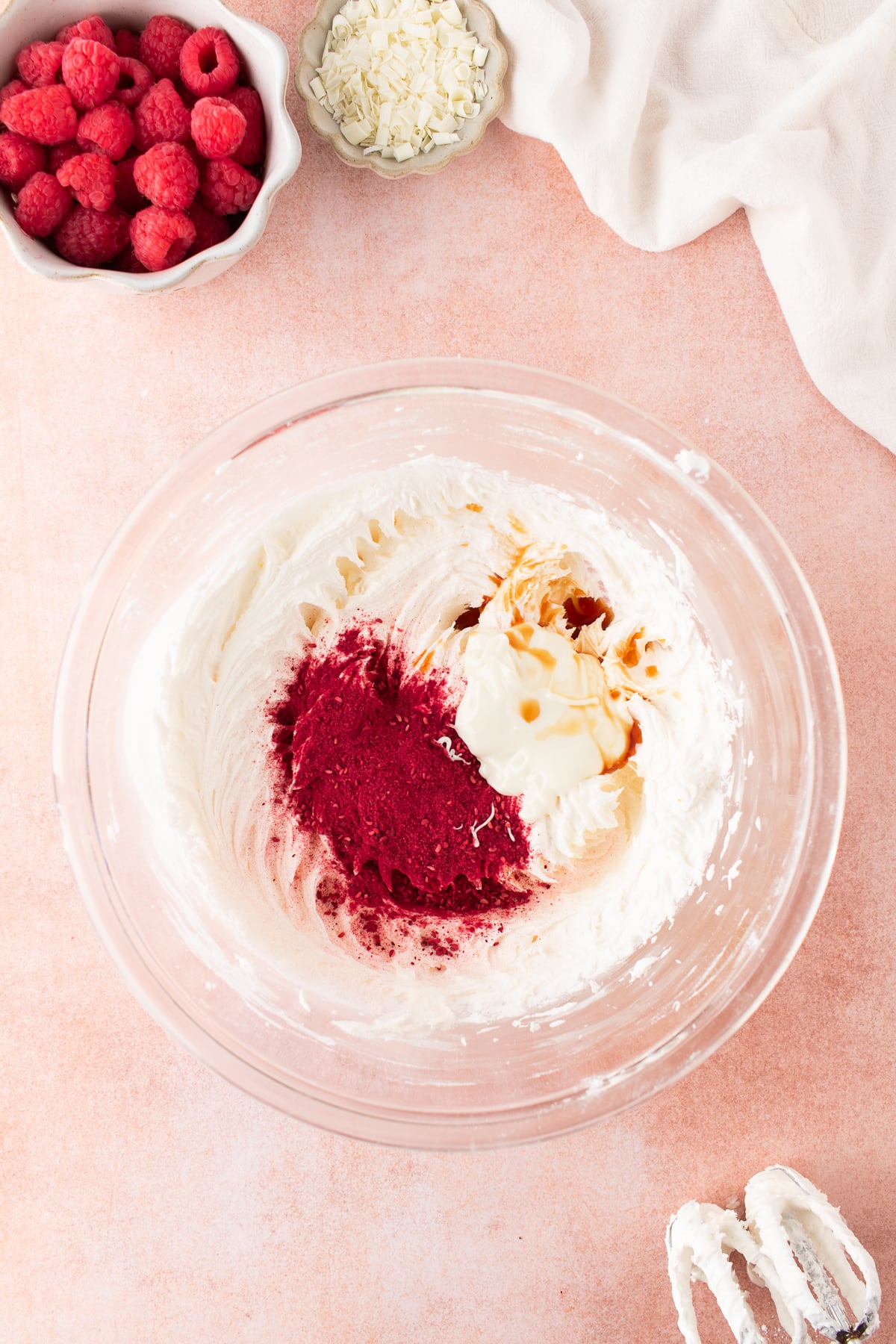 White chocolate raspberry buttercream in a mixing bowl.