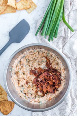 Cooled cooked bacon added to the large mixing bowl.